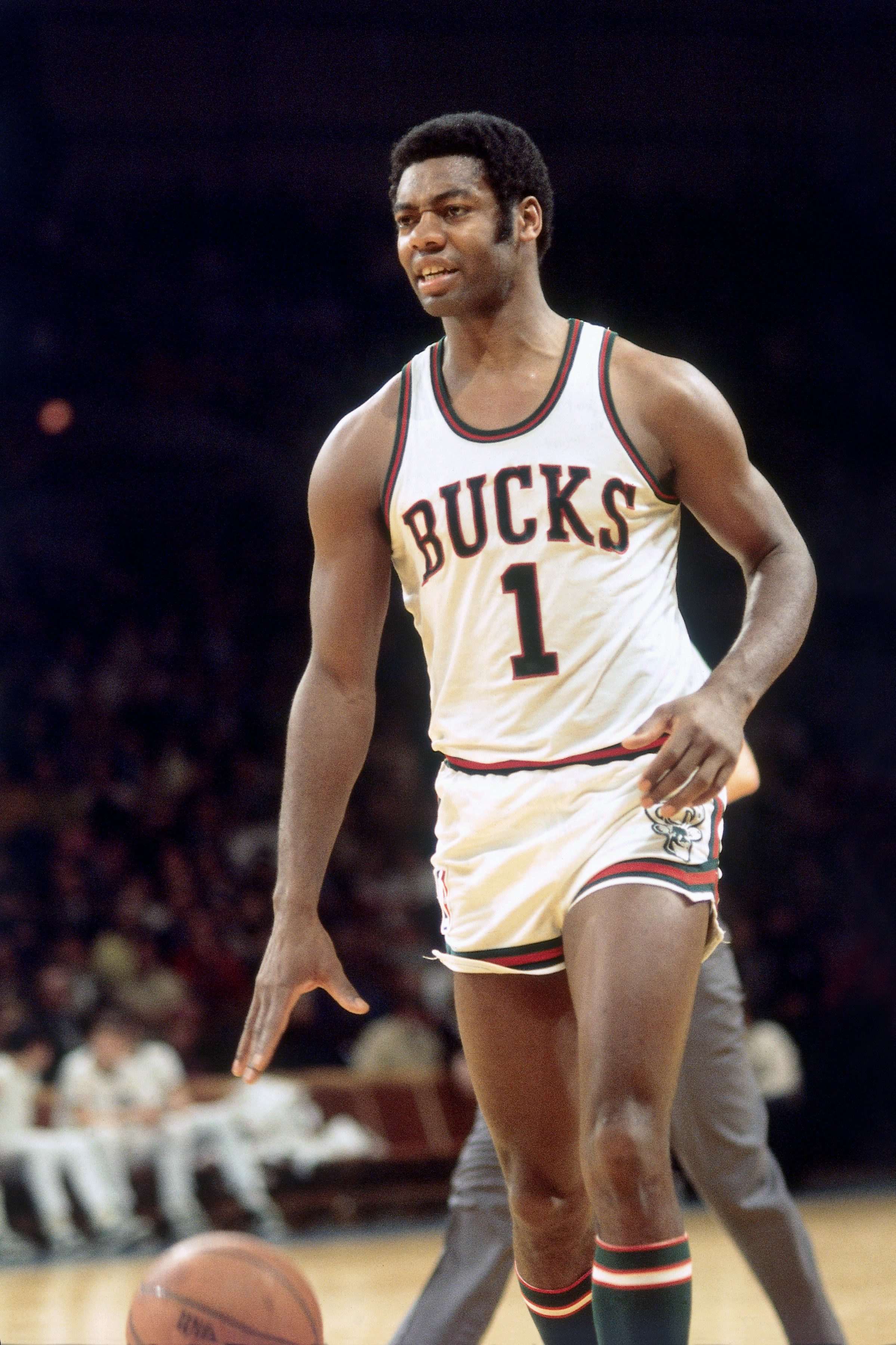 MILWAUKEE - 1970: Oscar Robertson #1 of the Milwaukee Bucks moves the ball up court during the 1970 season at the MECCA Arena in Milwaukee, Wisconsin. NOTE TO USER: User expressly acknowledges that, by downloading and or using this photograph, User is consenting to the terms and conditions of the Getty Images License agreement. Mandatory Copyright Notice: Copyright 1970 NBAE (Photo by Vernon Beiver/NBAE via Getty Images)